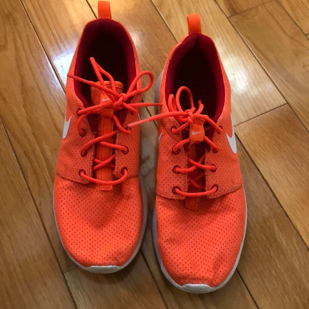 Salmon colored Nike roshes